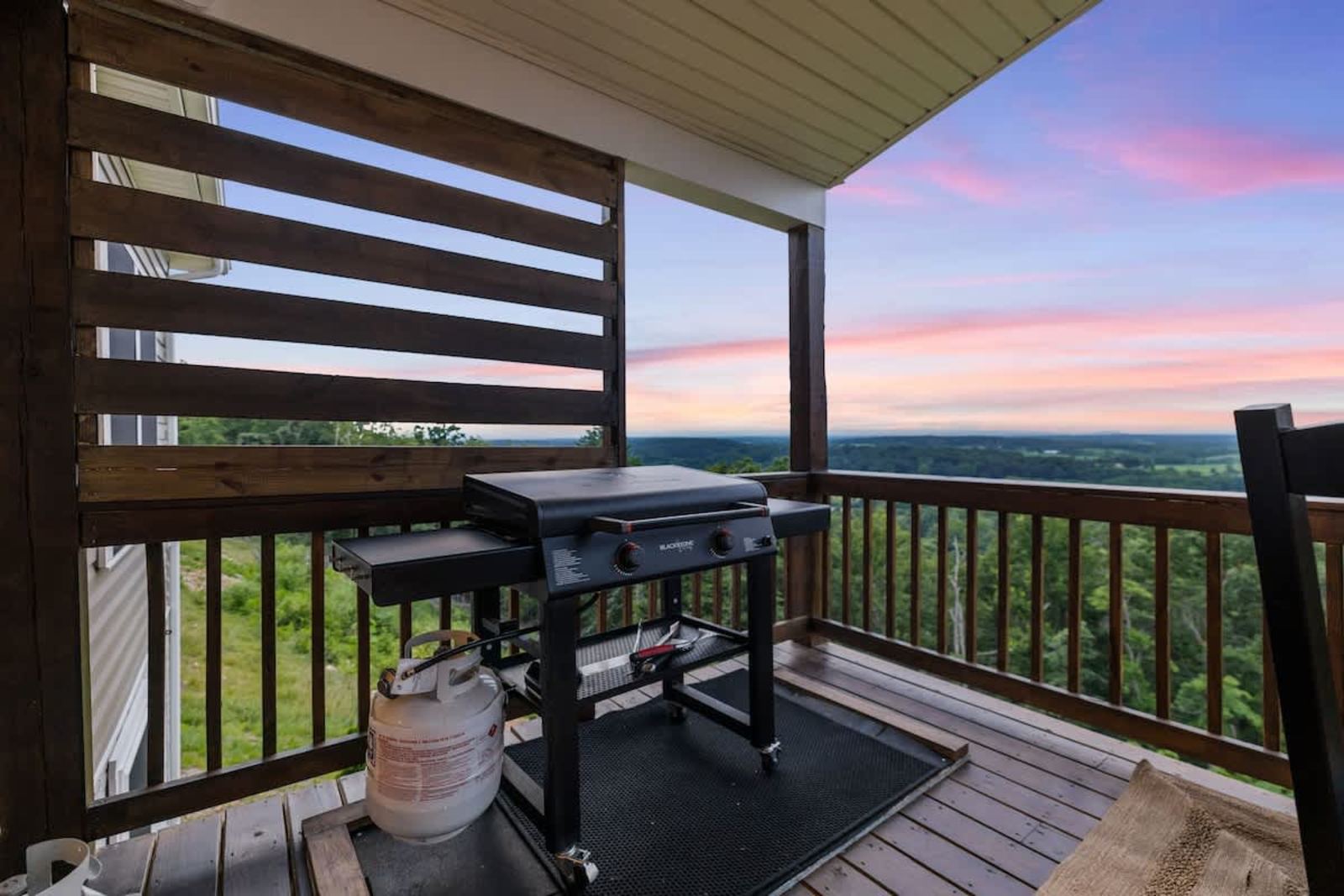 Blackstone griddle on the covered deck at sunset